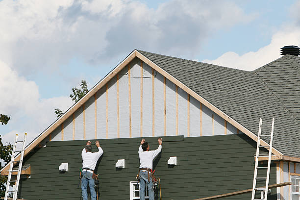 Professional Siding Installation technician working in Malden, MA